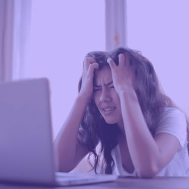 woman experiencing computer stress