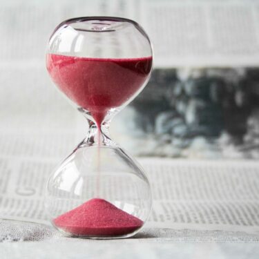 A sand timer symbolising time running out